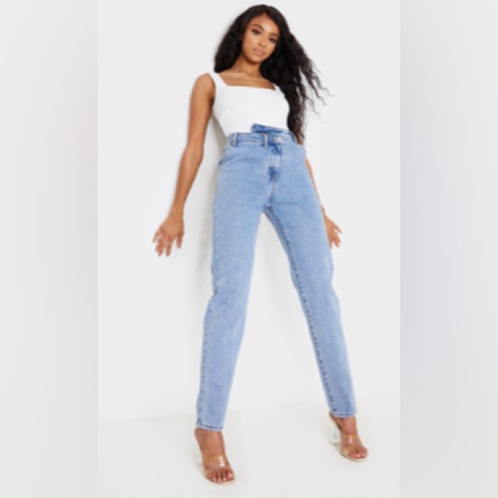 PRETTY LITTLE THING LIGHT BLUE WASH ASYMMETRICAL DENIM JEANS